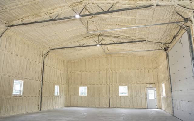 Large shop with spray foam on the walls and roof
